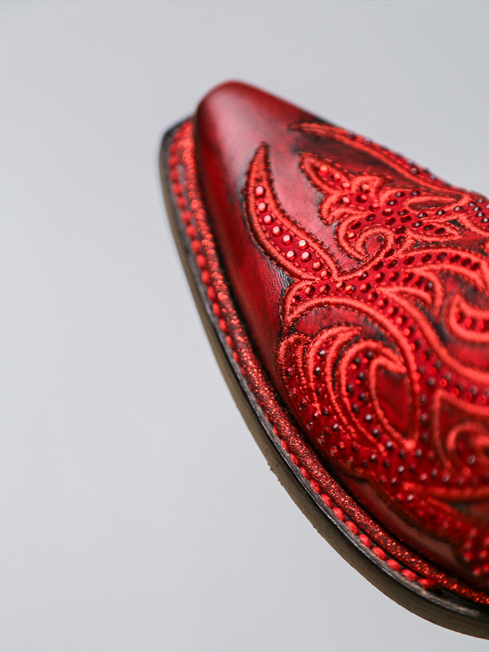 A4869 - WOMEN'S EMBROIDERY AND CRYSTALS RED AND BLACK TALL TOP SNIP TOE COWBOY BOOT